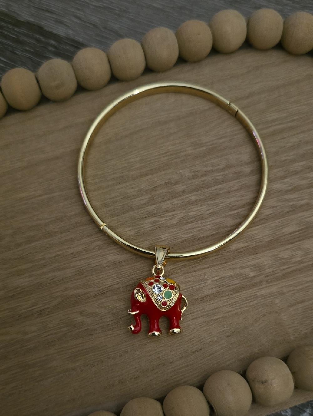 Gold Bangle Bracelet with Red Elephant Charm